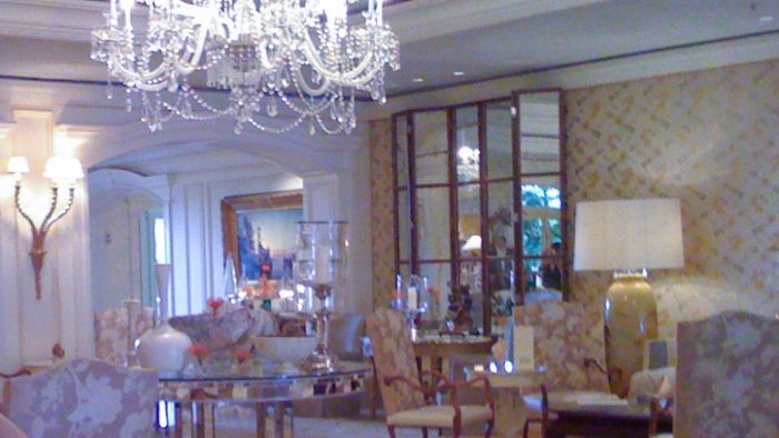 Bright and airy lobby with antique chandelier