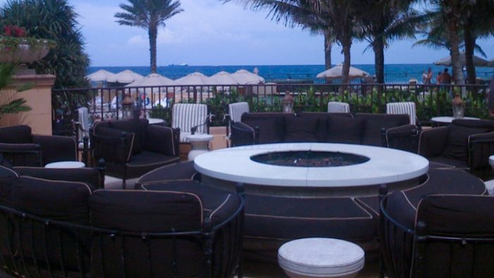The Ritz-Carlton West Palm Beach outdoor fireplace to keep guests warm at night