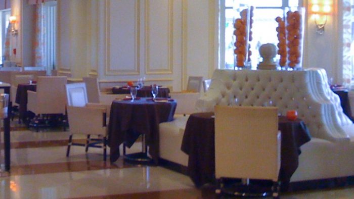 White tufted seating bench as the center piece