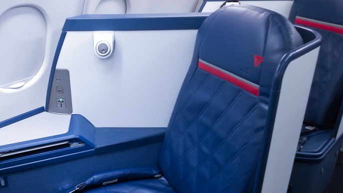 Delta First Class Atlanta Honolulu Delta's signature diamond stitch seat