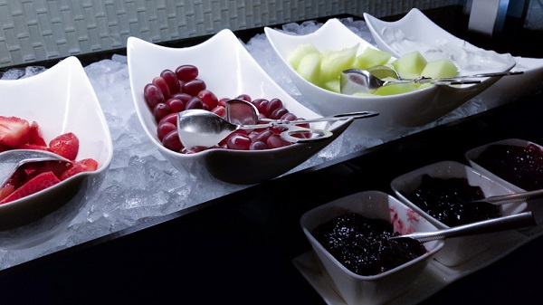 Grapes, melon, yogurt and assorted jam