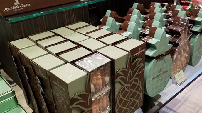 Boxes and can of Pineapple designs