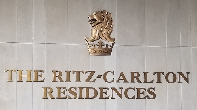 The Ritz-Carlton Residences Waikiki hotel sign with the lion on the crown logo