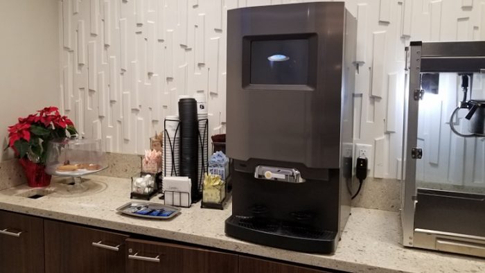 Refreshment center with coffee machine and popcorn machine