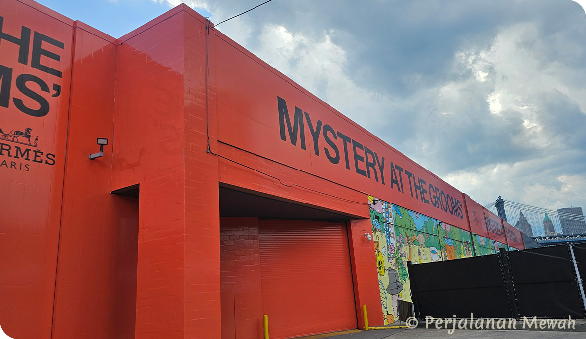 Hermès Mystery at the Grooms event entrance in bold black lettering on red building exterior at Pier 36