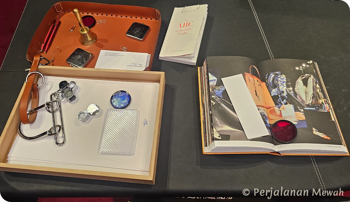 Hermès leather letter tray and open book with vintage equestrian images in the Head Groom’s Office