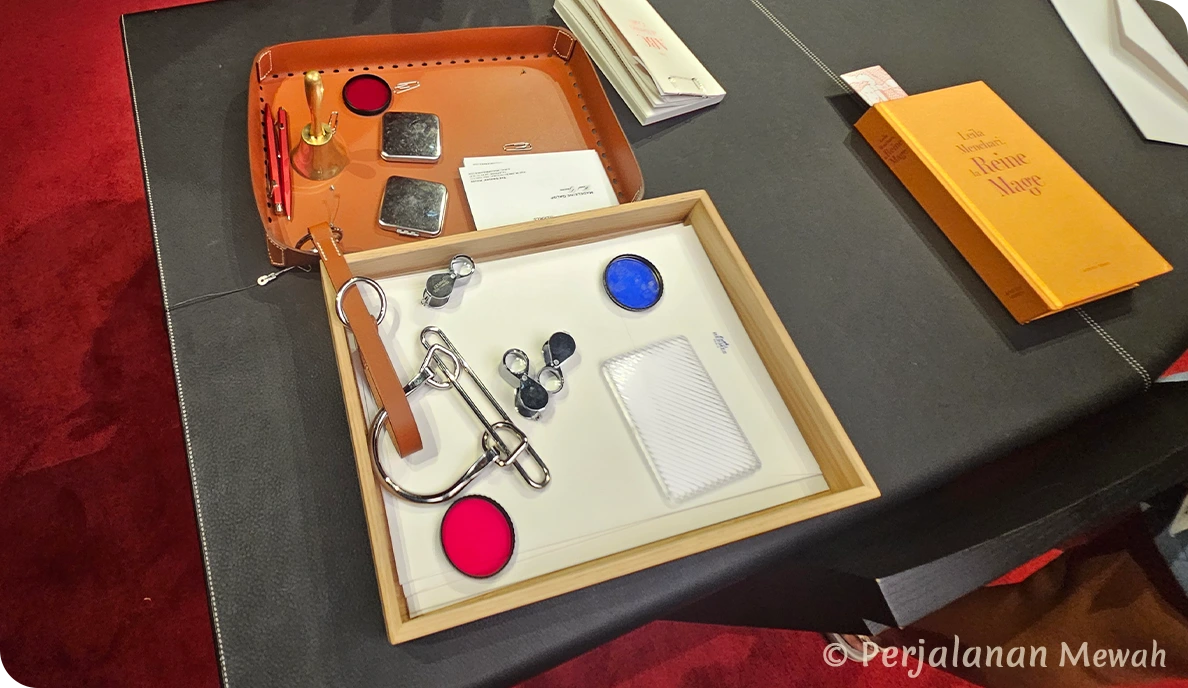 Close-up of Hermès letter tray with leather keychains and branded stationery in the Head Groom’s Office