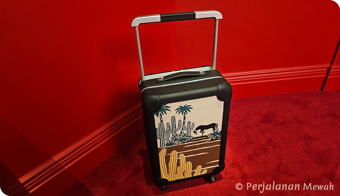 Hermès R.M.S. cabin suitcase with desert motif in the Head Groom’s Office red interior