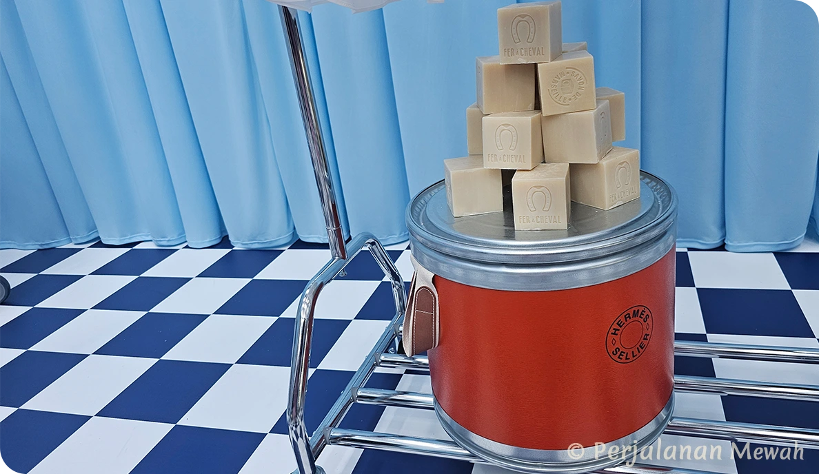 Fer à Cheval soaps stacked on Hermès Sellier drum
